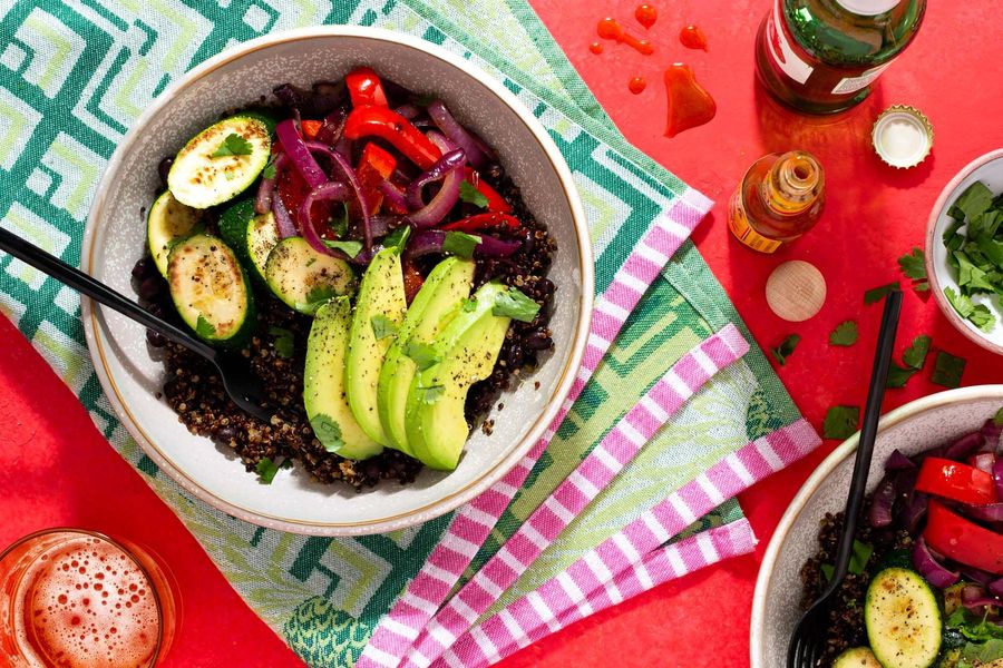 Black bean and quinoa Buddha bowls with zucchini and avocado