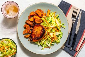 Orange chipotle–glazed pork with coleslaw and roasted sweet potato