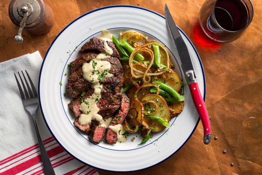 Black Angus rib-eyes with horseradish mayo and Lyonnaise potatoes