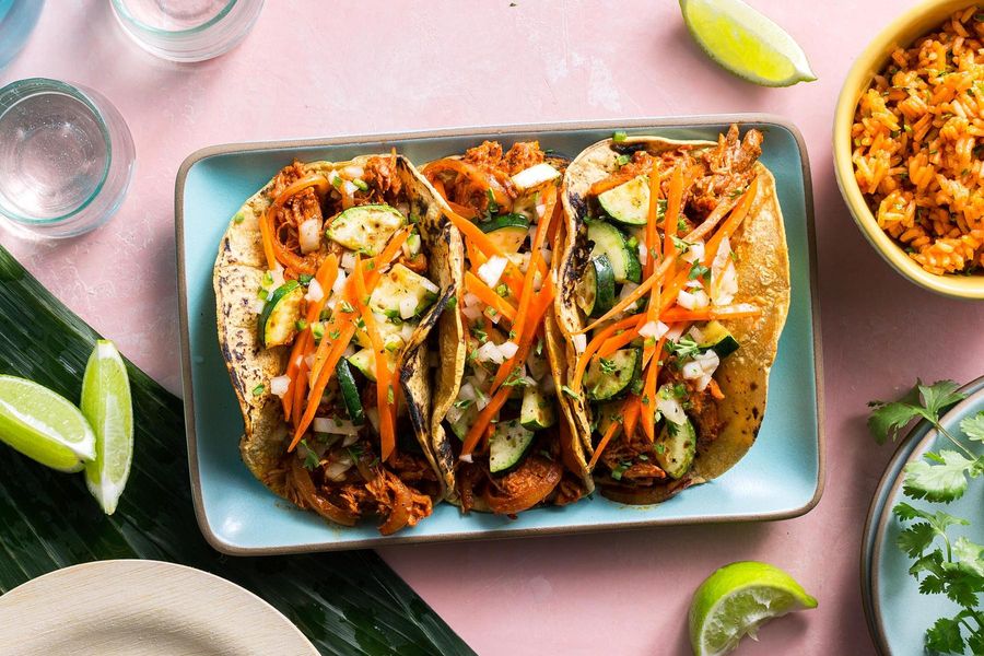 Yucatan pulled pork tacos with cilantro-carrot salsa and Mexican rice