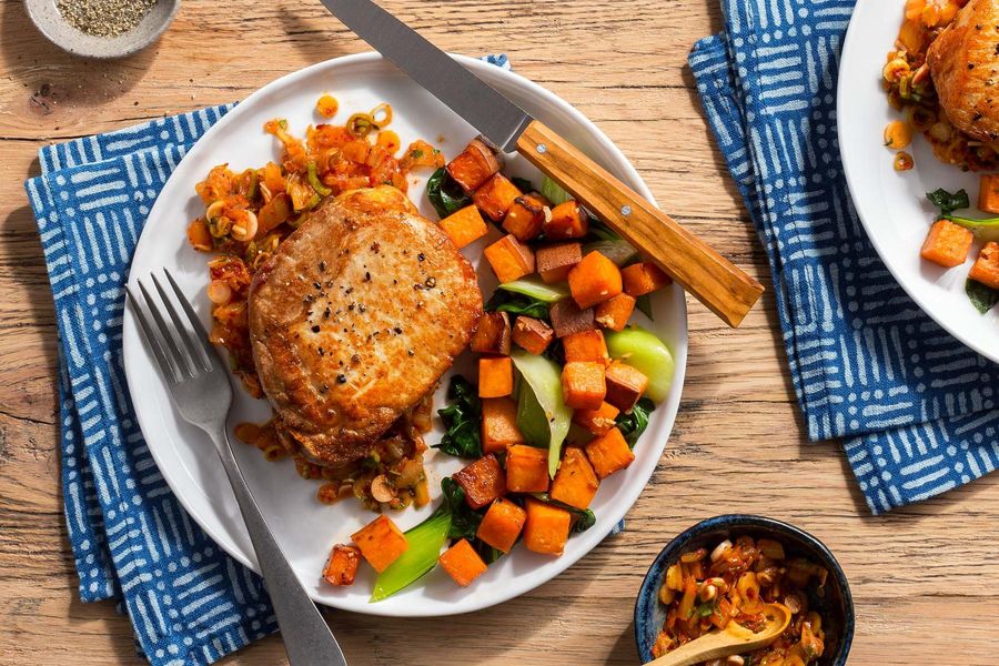 Pork chops with kimchi “chimichurri” and sweet potato–bok choy hash