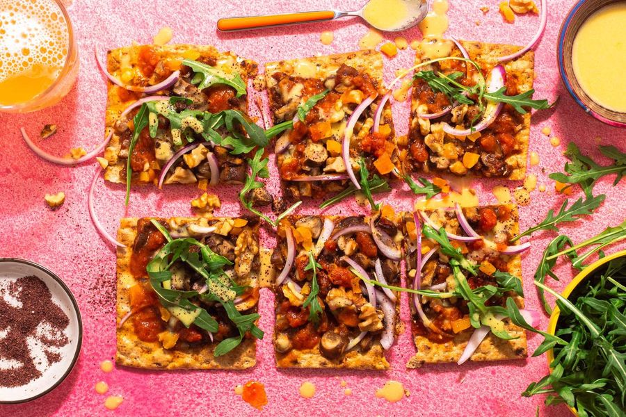 Walnut-mushroom flatbreads with apricots and lemon-tahini dressing