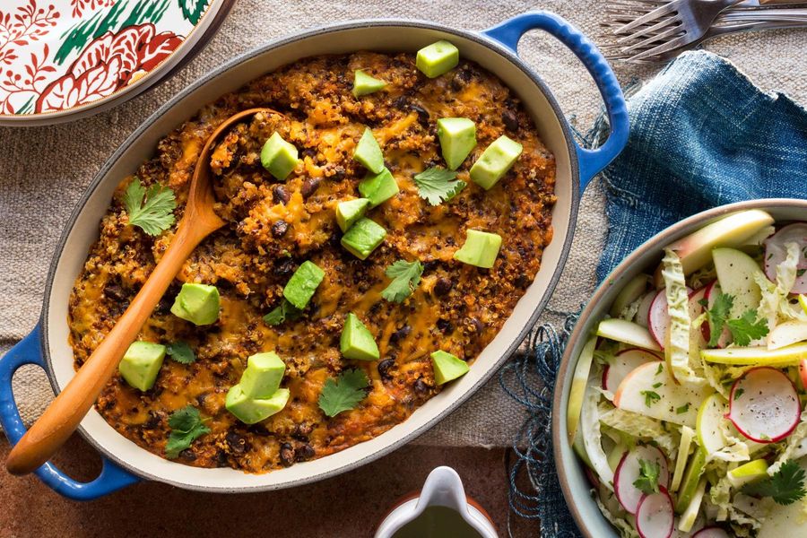 Quinoa and black bean enchilada casserole with radish-apple salad