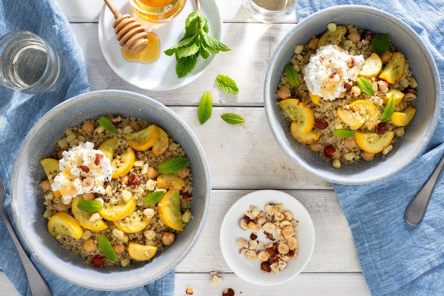 Warm quinoa and corn salad with summer squash, ricotta, and hazelnuts