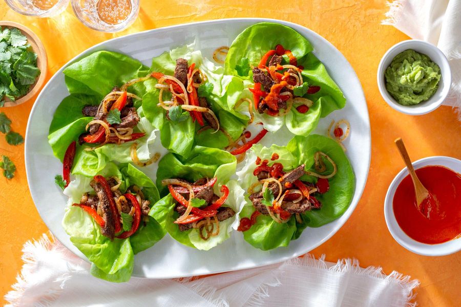 Steak fajita lettuce wraps with New Mexican chile salsa and guacamole