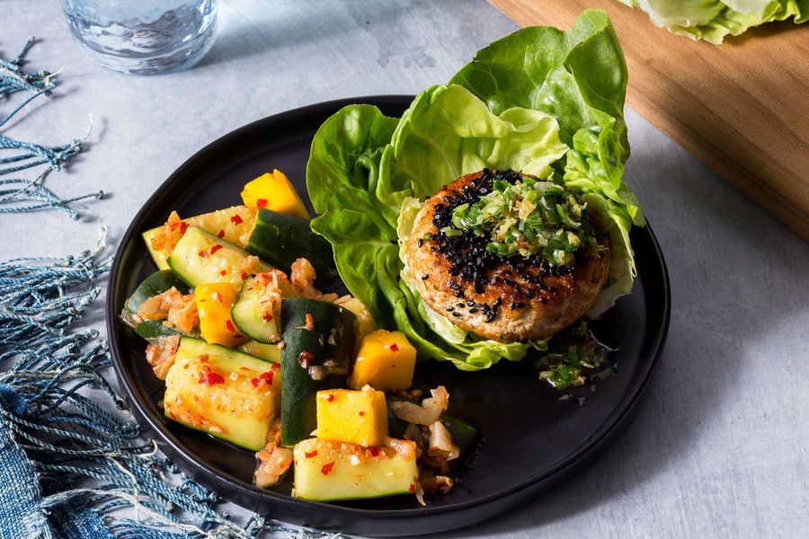 Lettuce-wrapped salmon burgers with cucumber-kimchi smash