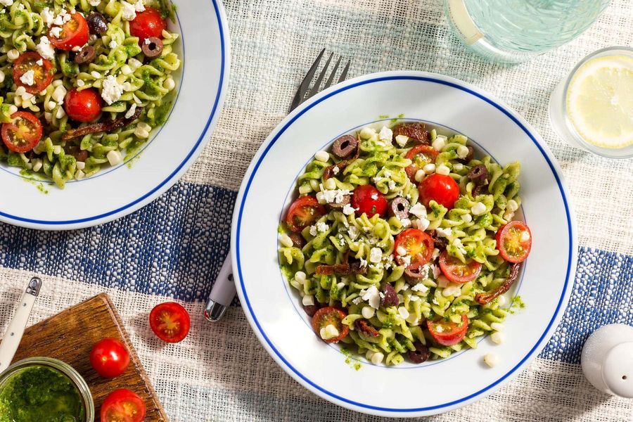 Quick pesto pasta salad with tomatoes, corn, and feta