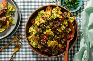 Farfalle with ground beef, yellow squash, and arugula-pistachio pesto