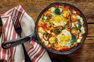 Mushroom-zucchini shakshuka with chickpeas, feta, and toasted pitas