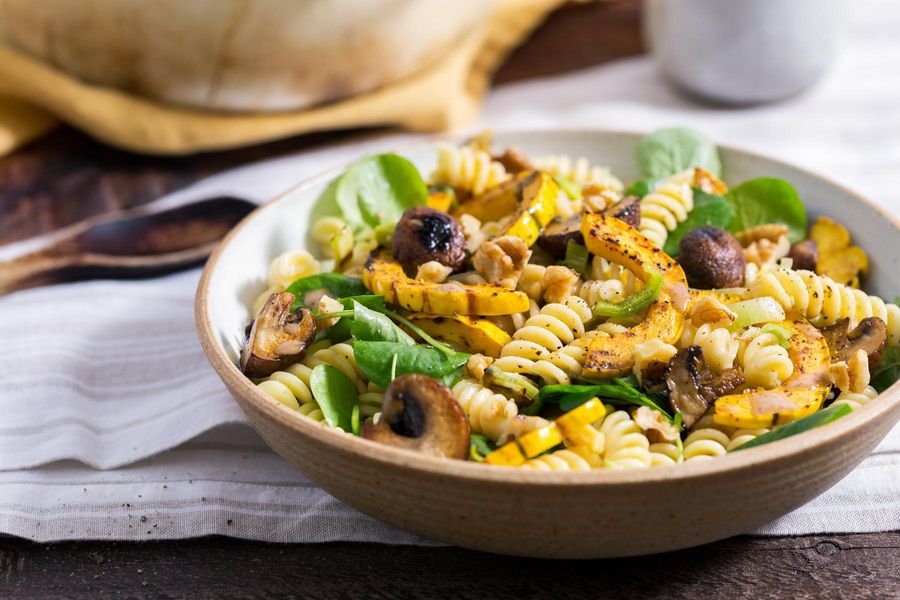 Warm fusilli salad with roasted winter squash and mushrooms