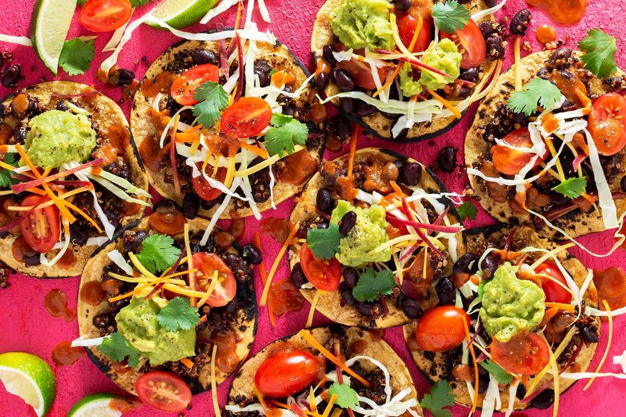 Southwestern quinoa–black bean tostadas with cabbage slaw and guacamole