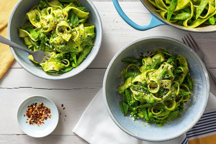 Fresh pappardelle verde with sweet pea pistou and sugar snap peas image